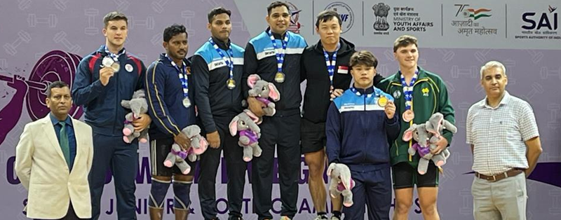 Weightlifting barbell and plates on the competition platform